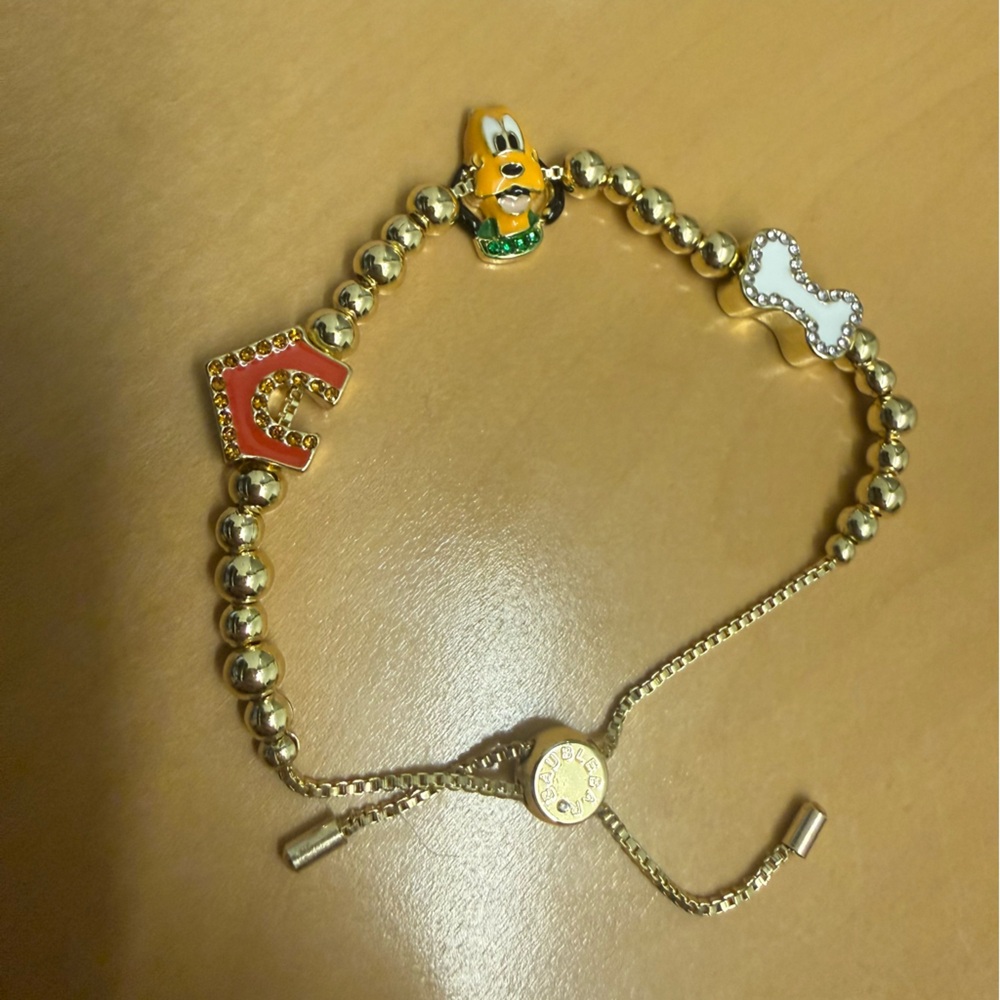 Gold Beaded Bracelet with Pluto themed Charms